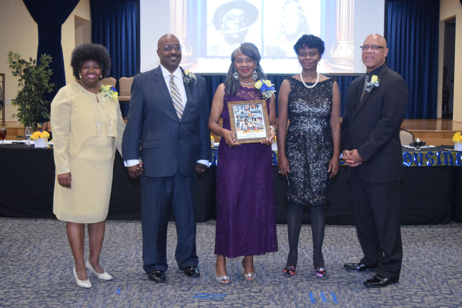 Joel Gadson Williams accepts Legacy Award for Gadson Grocery.